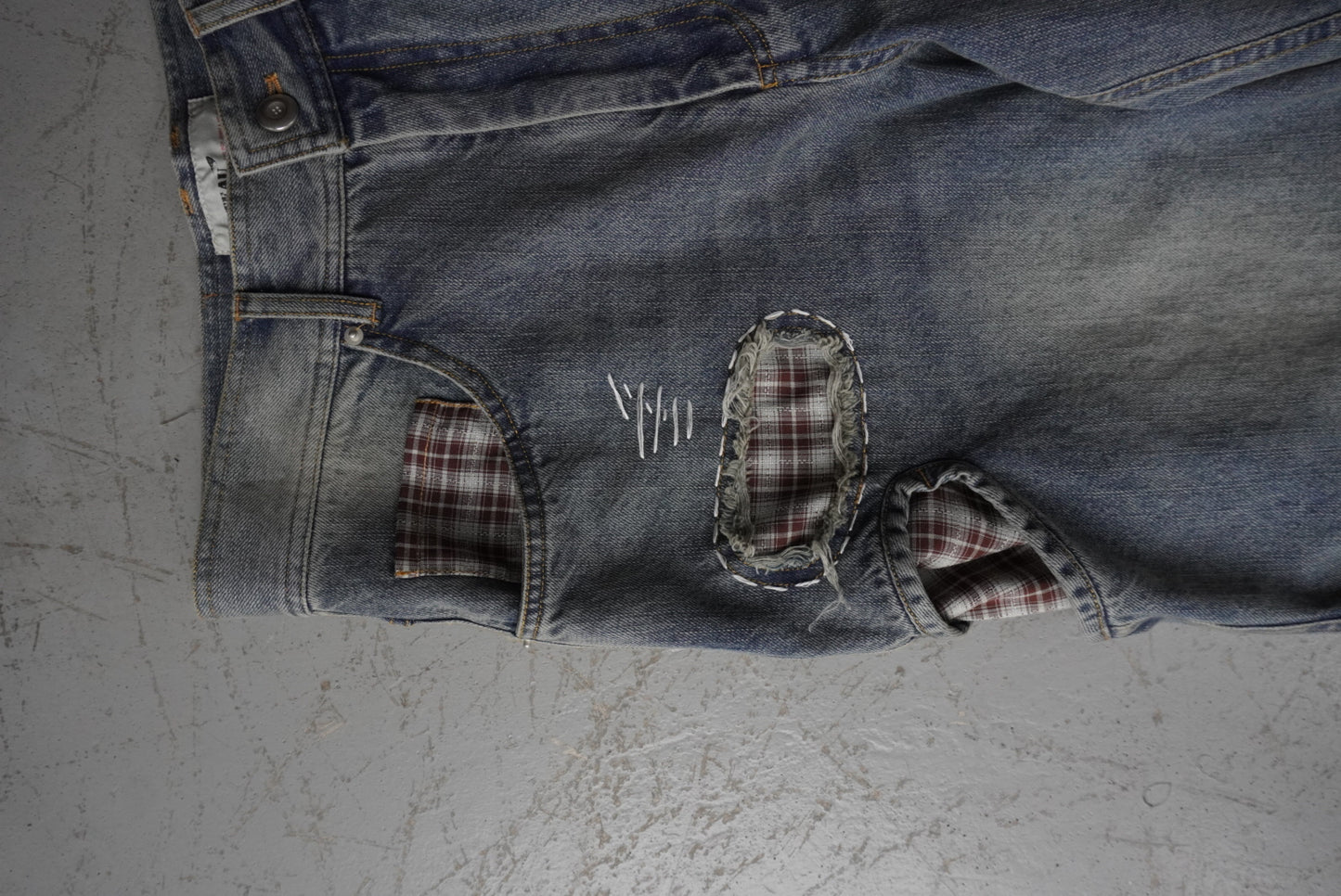 Patch denim pants