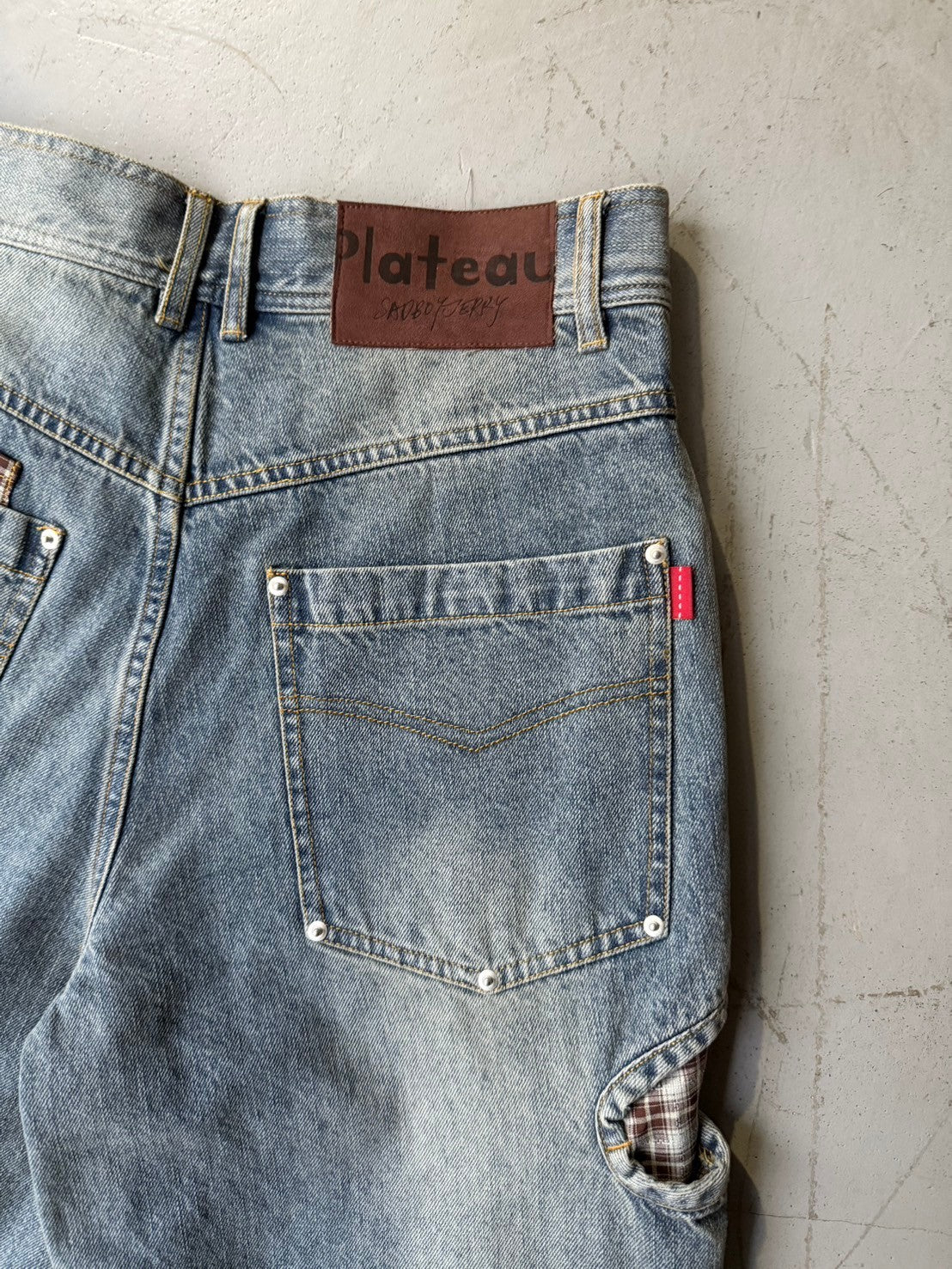 Patch denim pants