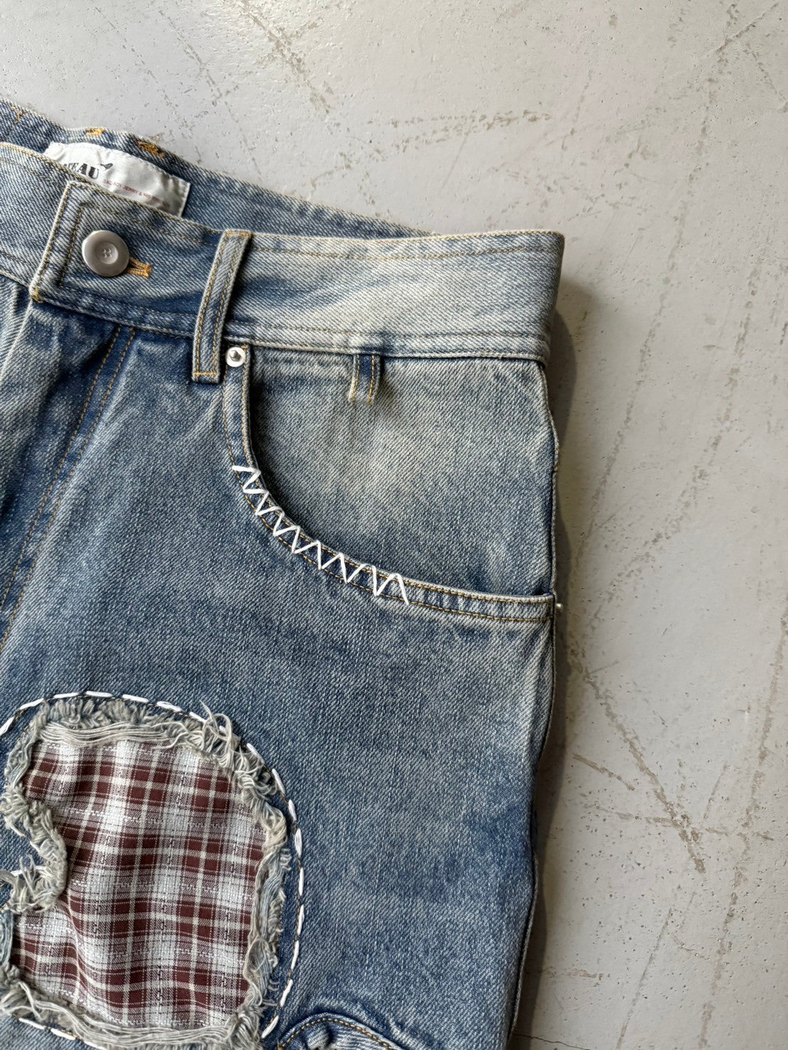 Patch denim pants