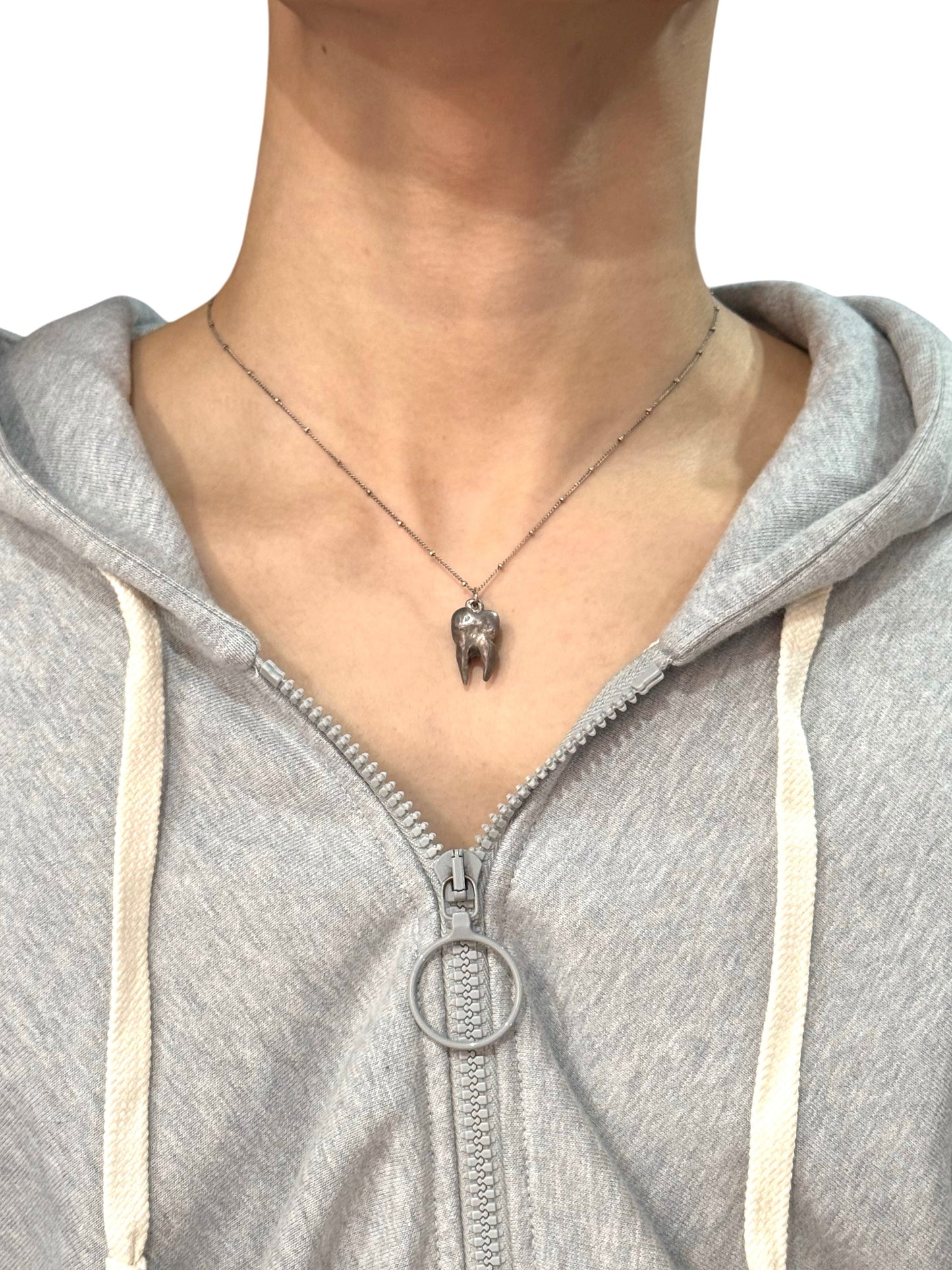 Silver tooth necklace