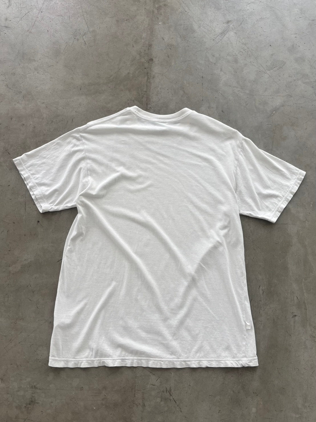 Undercover Triceratops Graphic Tee