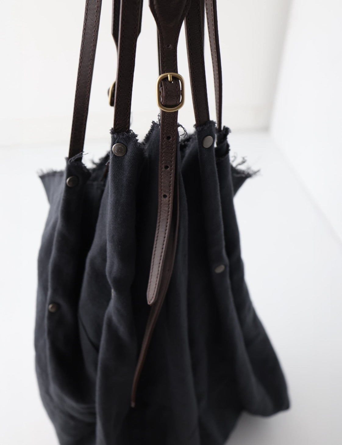 Four Handle Bag