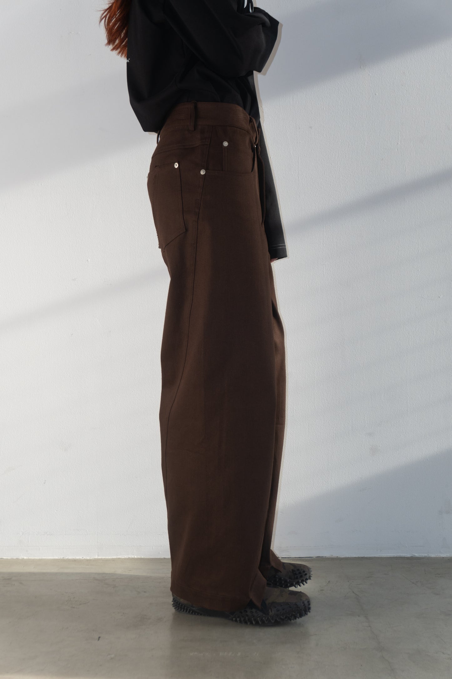 Swivel waxy trousers
